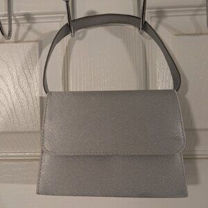 Versatile silver clutch for dressy occasions!!